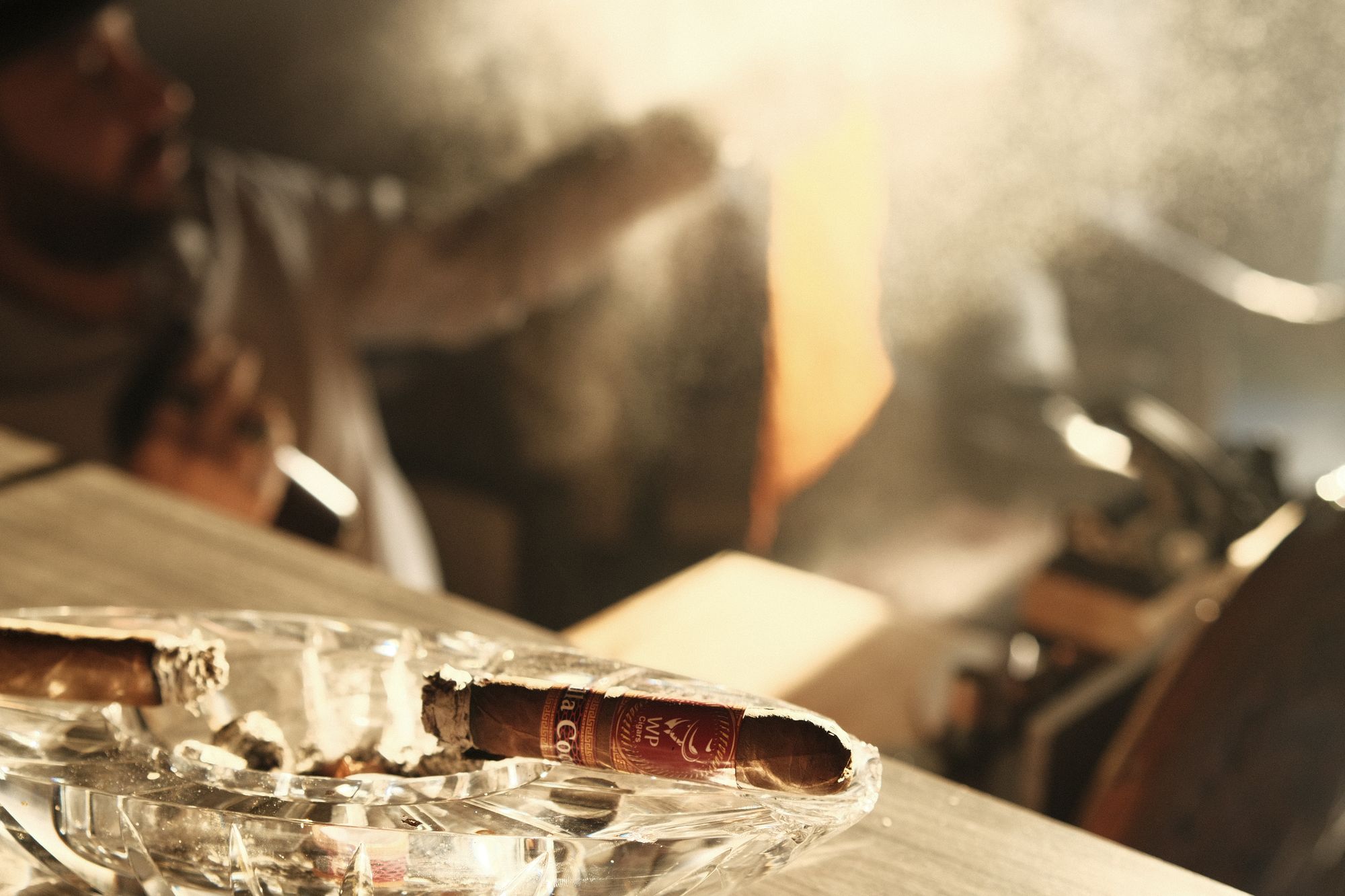 Lighting up at the bar