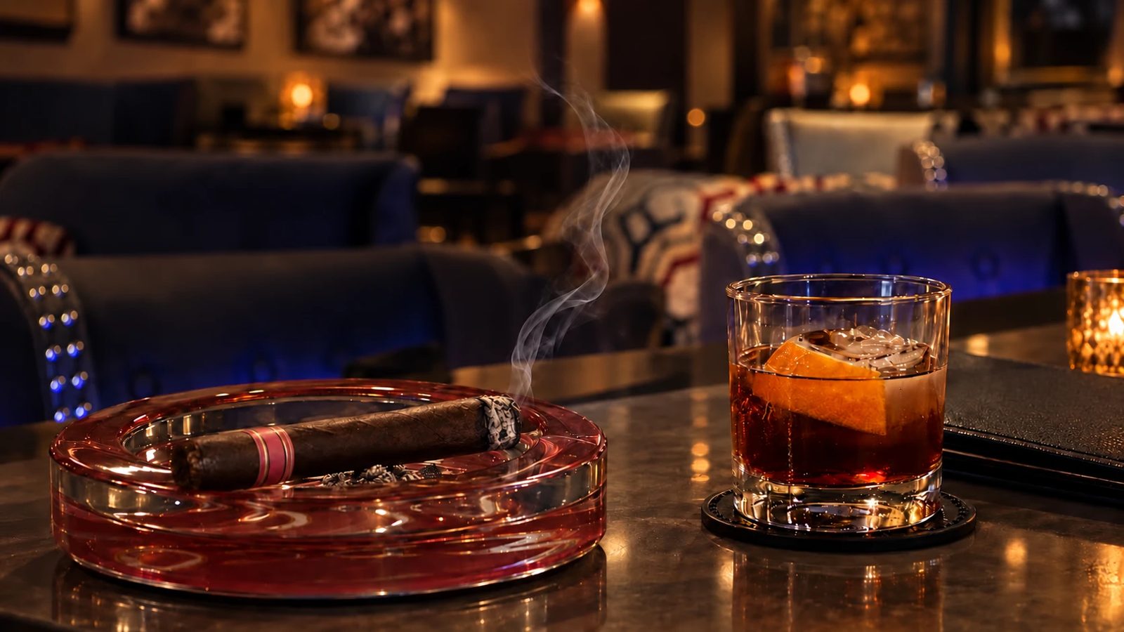 A cigar and an old fashioned in the lounge